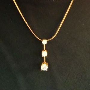 Avon clear stone necklace with gold tone flat chain  Unicorn necklace